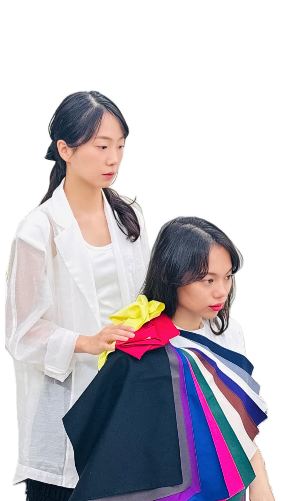 Tanya draping a client with color fabric swatches during a personal color analysis session